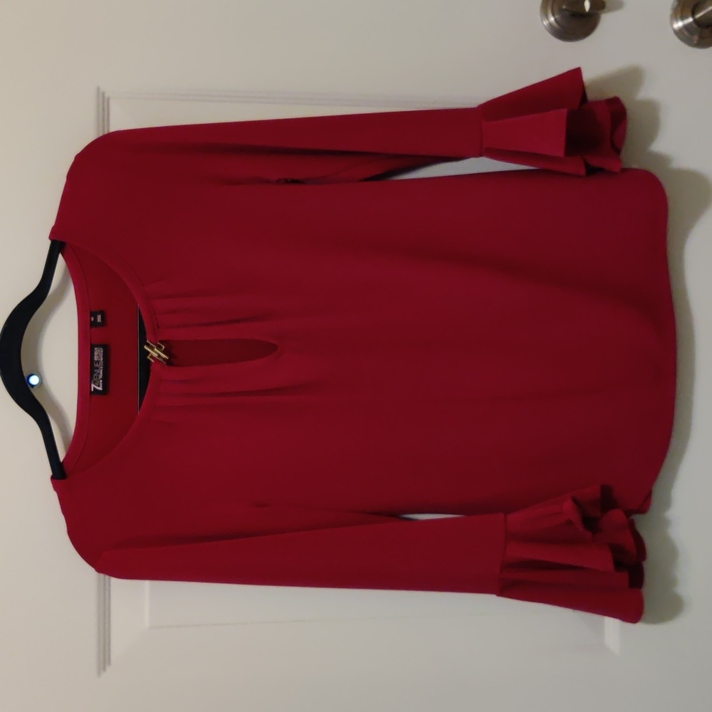 Extra Small Top, magenta color with ruffle at the cuff. 7th Avenue Design Studio